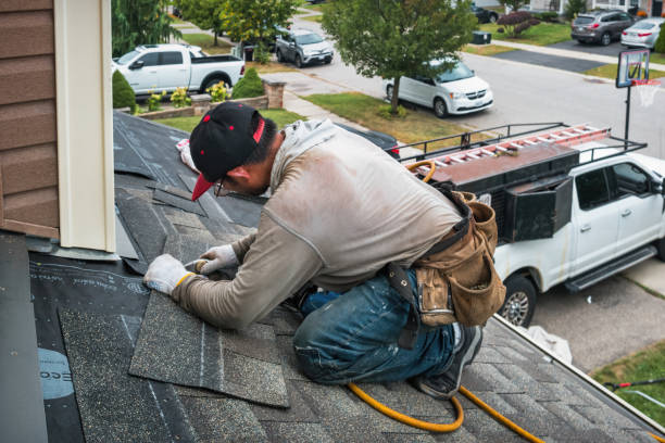 Professional Roof Replacement technician working in Rogers, TX